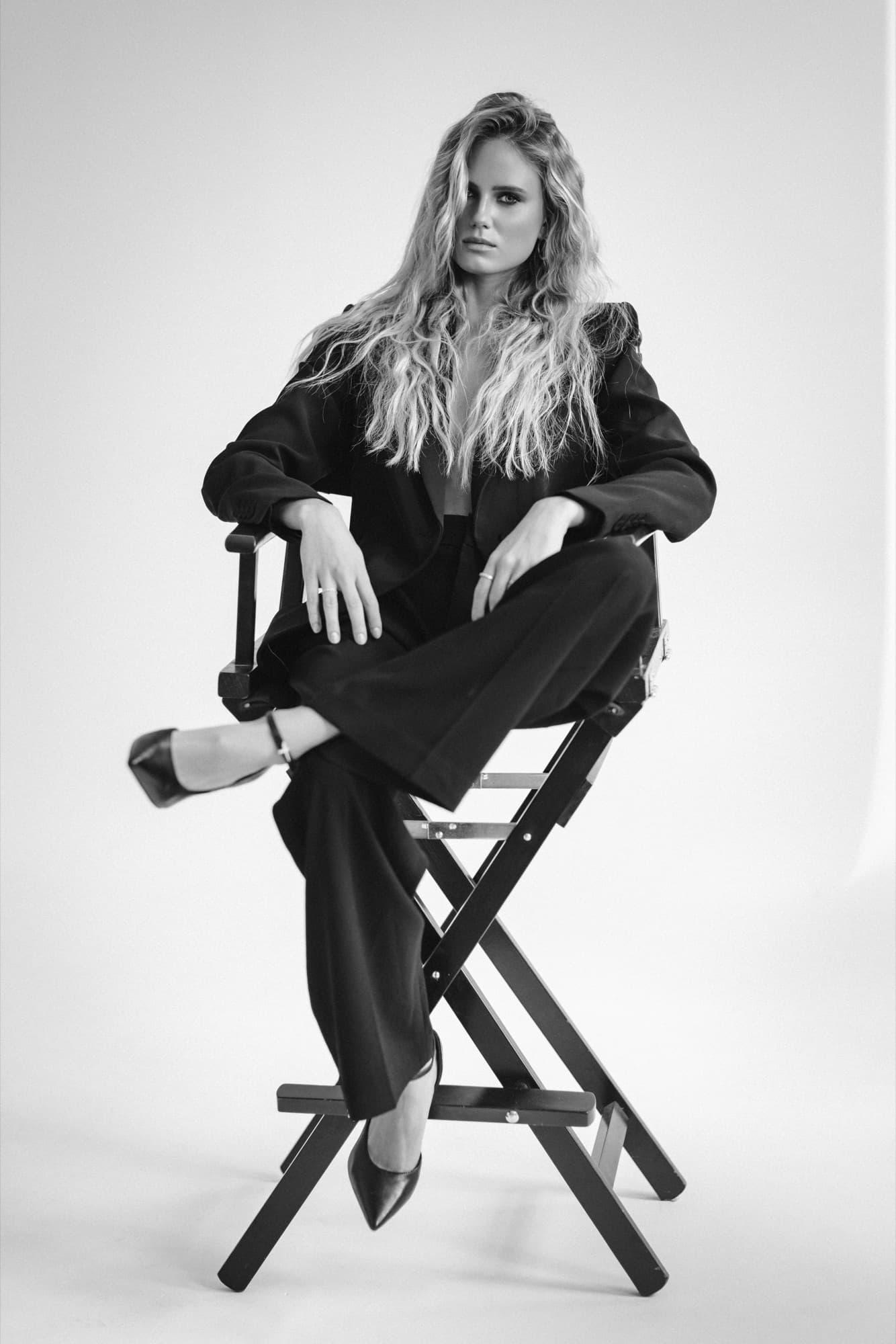 Emilia Niglas seated on a director's chair